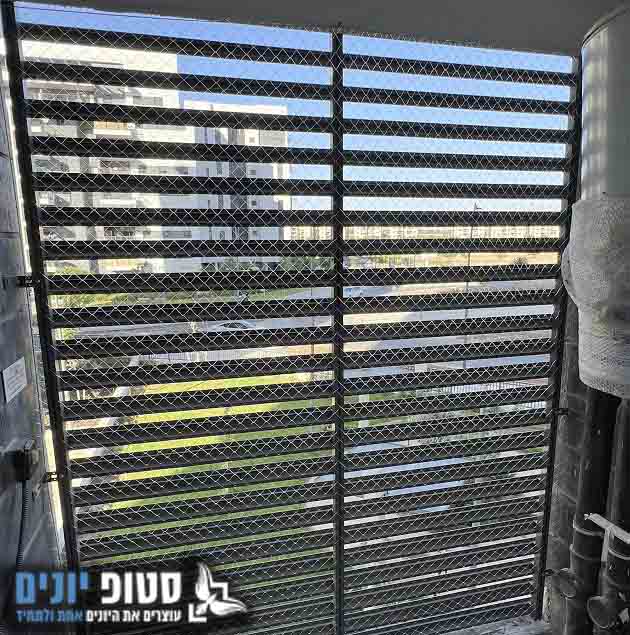 הרחקת יונים ממסתור כביסה במודיעין